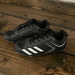 Adidas baseball cleats.